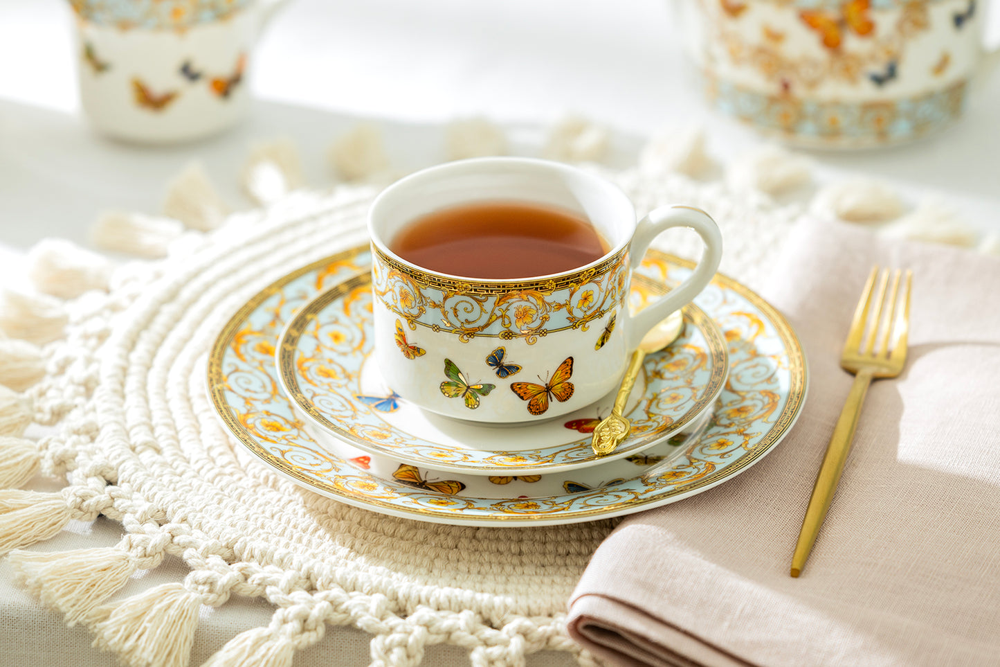 Butterflies with Blue Ornament Tea Cup and Saucer