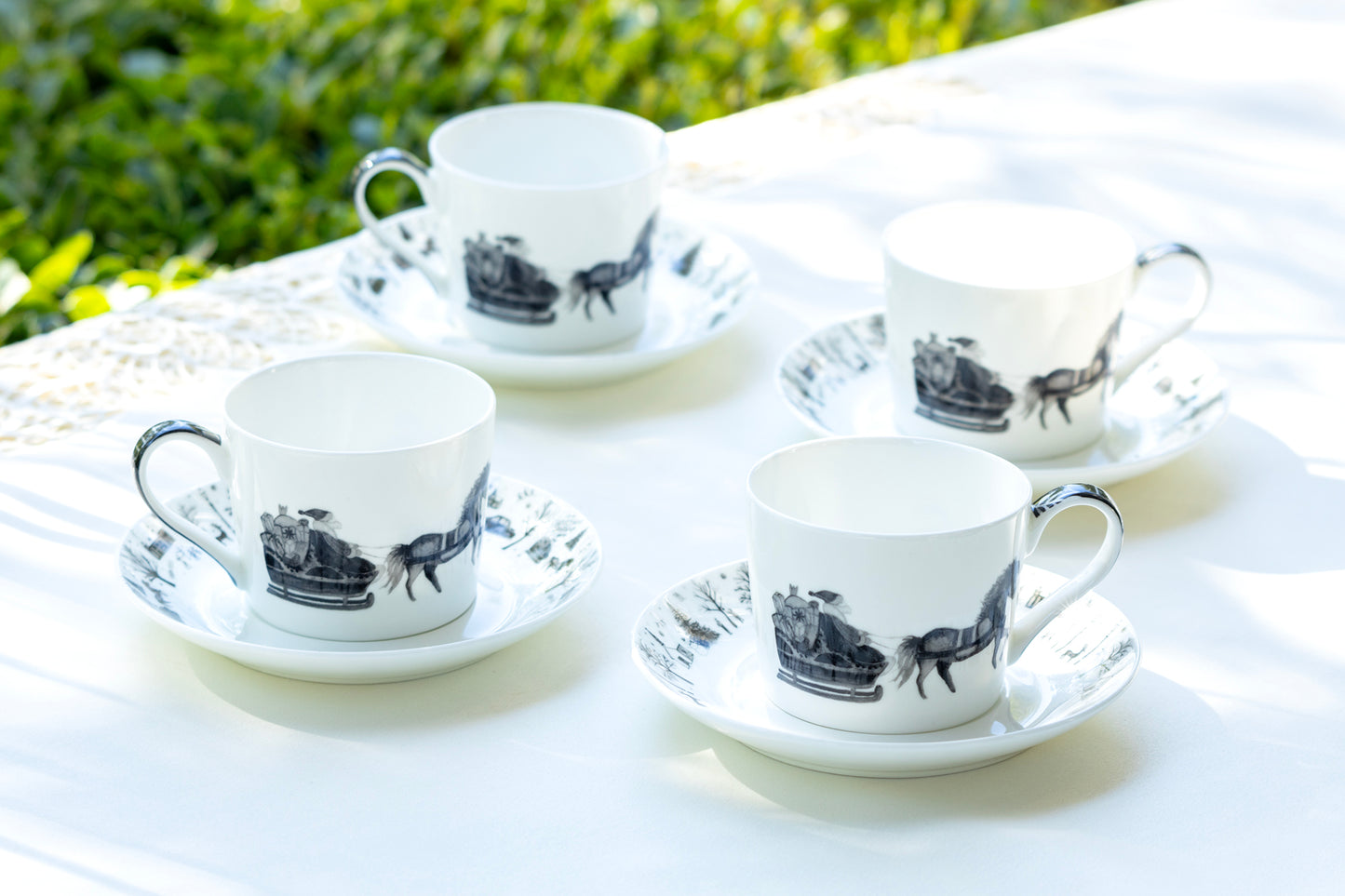 Stechcol Gracie Bone China Winter Wonderland Santa Carriage Bone China Tea Cup and Saucer set of 4