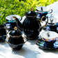 Grace Teaware Assorted Black Gold Luster Tea Cups and Saucers 11-Piece Tea Set, spider, skull, crow, witchy crystal ball tea cups