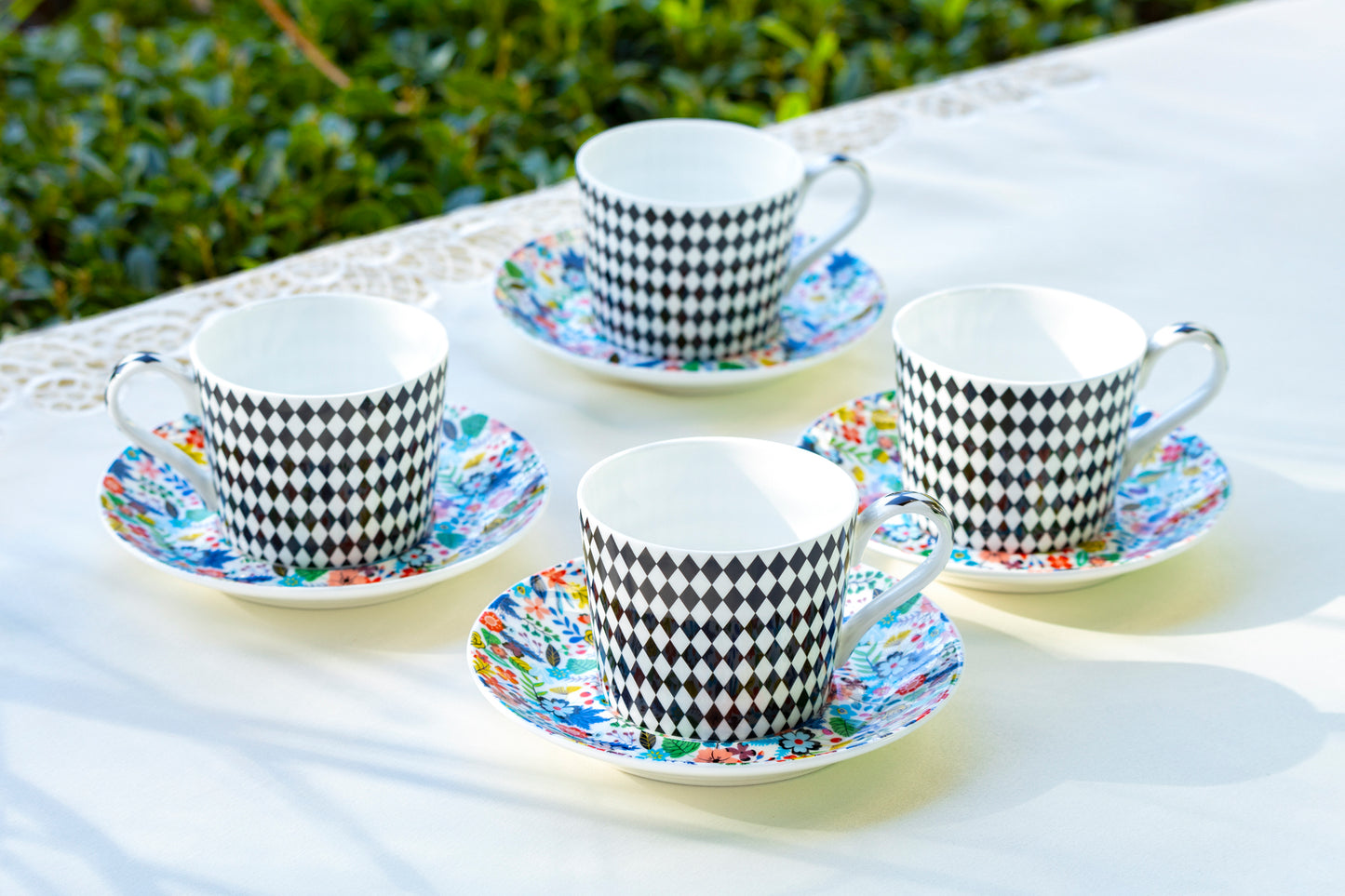 Stechcol Gracie Bone China Mad Hatter Bone China Cup and Saucer set of 4