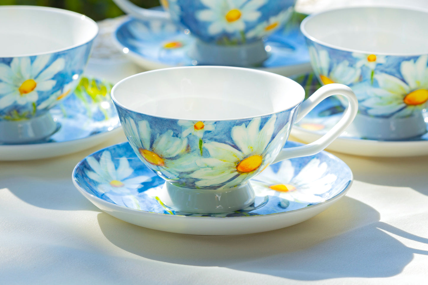 Daisy with Pastel Blue Bone China Tea Cup and Saucer