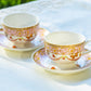 butterflies with pink ornament teacup