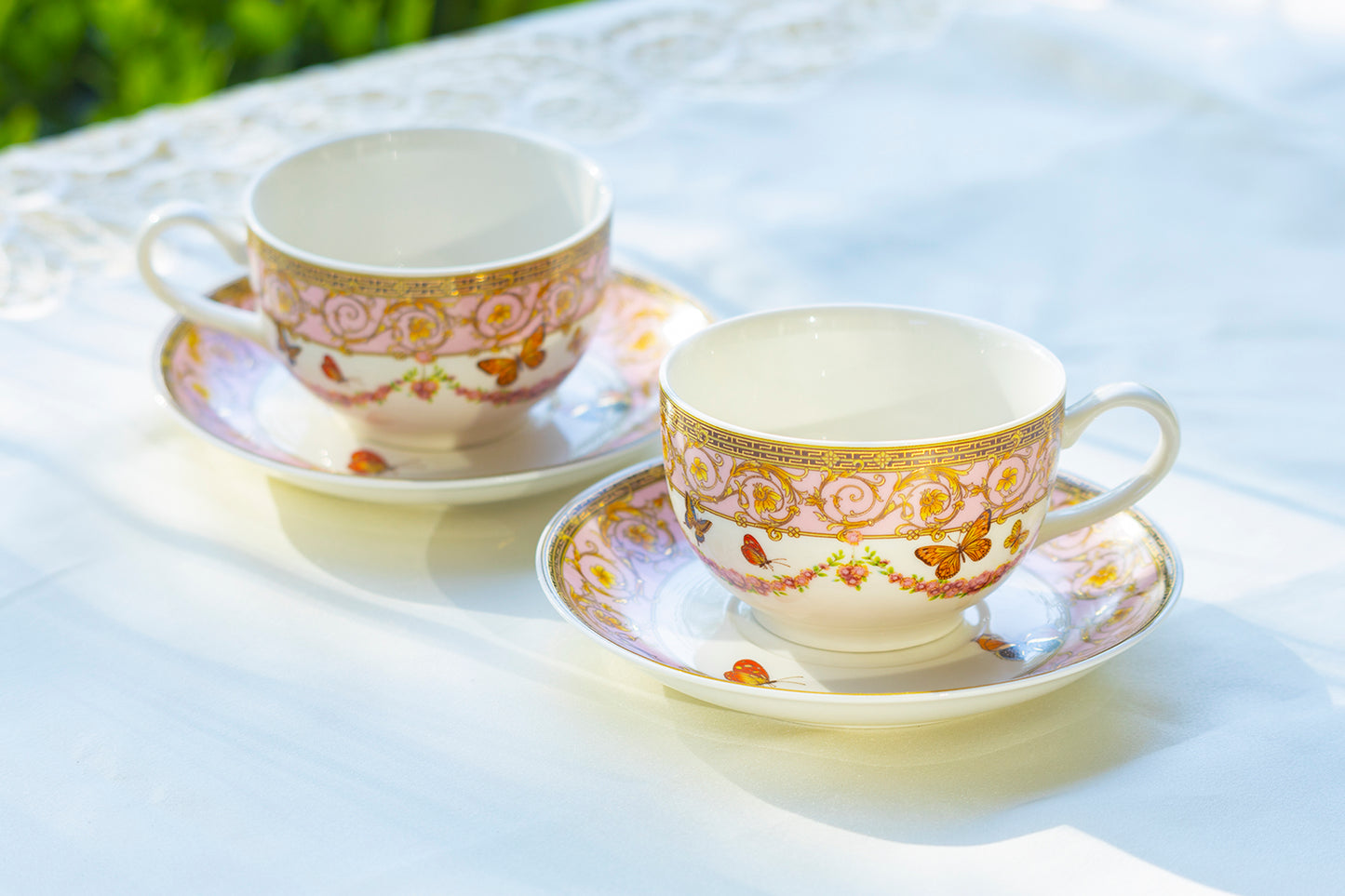 butterflies with pink ornament teacup