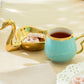 Golden Swan Turquoise Fine Porcelain Tea Cup and Saucer