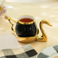 Golden Swan Black Fine Porcelain Tea Cup and Saucer