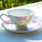 white rose pink tea cup