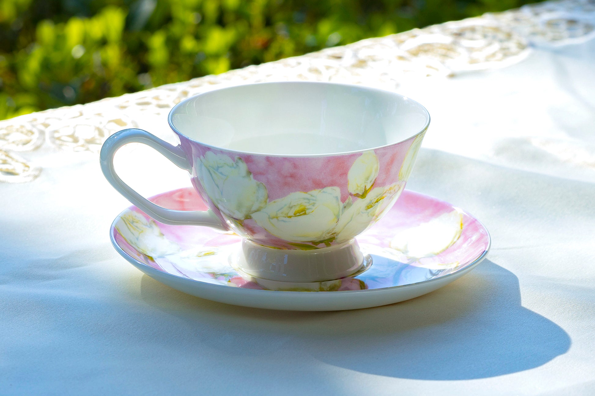 white rose pink tea cup