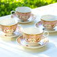 set of four cup and saucer floral butterfly pink