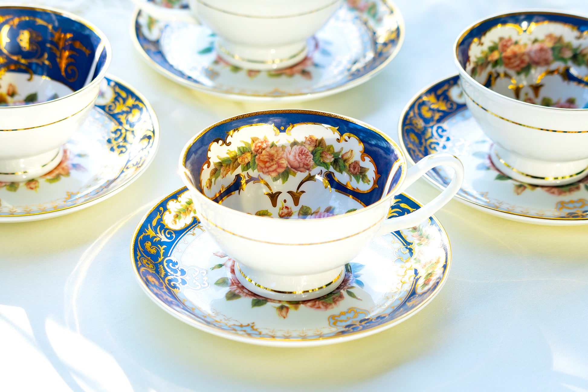 rose teacup with royal blue gold