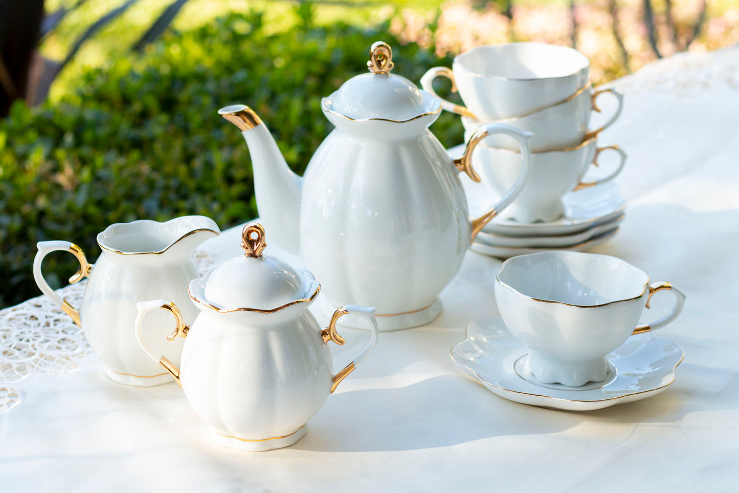 white gold tea set sugar creamer teapot cup saucer